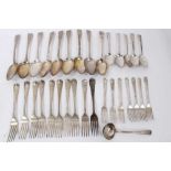 Composite set of early 19th century Old English pattern flatware, with armorial crest. 32 pieces.