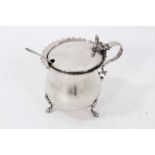 Late Victorian silver mustard pot of baluster form, with shaped rim and scroll handle