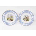 Pair of New Hall plates, circa 1815-20, with printed and coloured titled scenes, the edges with reli