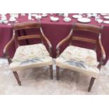 Set of eight Regency mahogany dining chairs, each with bar back and tapestry seat on ring turned leg