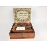 Edwardian oak artist's box by G.Rowney & Co, with contents, the box measuring 24cm across
