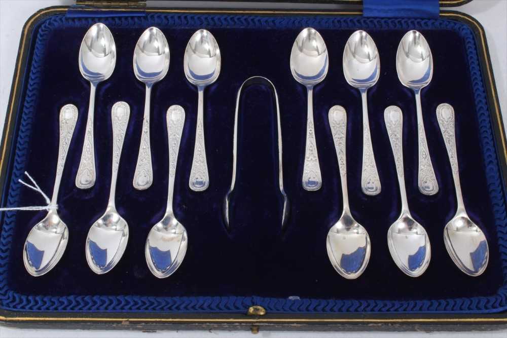 Late Victorian/Edwardian silver matched set of twelve teaspoons and pair of sugar tongs, - Image 2 of 3