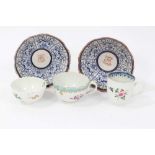 A Worcester coffee cup, a tea cup, a tea bowl in the Hibiscus pattern, and two Royal Lily pattern la