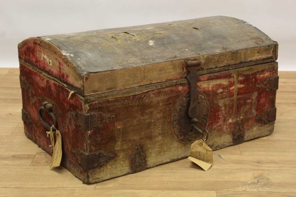 Good 17th century velvet upholstered dome top trunk with iron strap work mounts Provenance: Remov