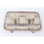 1920s silver ink stand of rectangular form, with two silver inkwells.
