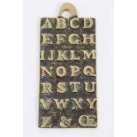 18th century style brass alphabet plaque