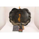 Large Victorian lacquered tray with a portrait of Napoleon, together with a lead plaque of Napoleon,