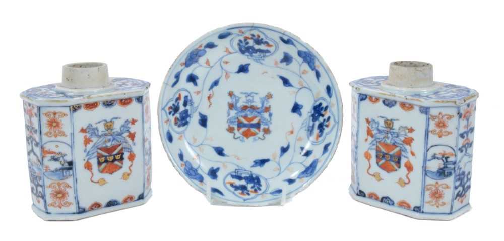 Pair of early 18th century Kangxi Chinese Imari armorial tea canisters and saucer (3)