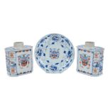 Pair of early 18th century Kangxi Chinese Imari armorial tea canisters and saucer (3)