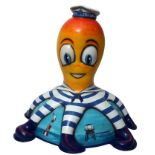 Sailor Buoy by Mik Richardson – Happy orange character in striped sailor suit with hat on base depic