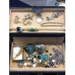 Jewellery box containing costume jewellery and two 9ct gold chains and silver chains