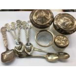 Group silver and white metal spoons, silver topped glass jars and other items
