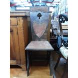 Oak Arts and Crafts side chair with studded upholstery