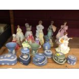 Collection of figurines, including Doulton and Worcester