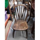 Pair of old stick back chairs with elm seats on turned supports