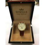 Sewills Millenium limited edition 9ct gold cased wristwatch on brown leather strap, boxed
