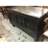 Antique carved oak coffer with rising top