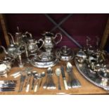 Plated ware including serving tray, coffee pots, entree dishes and flatware