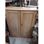 Old pine cupboard with shelved interior enclosed by two panelled doors, 98cm wide, 35cm deep, 123cm