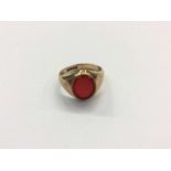 9ct gold signet ring with inset oval hard stone