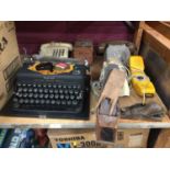 Vintage phones, vintage imperial typewriter, planes and tins