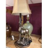 A stag resin table lamp and china table lamp
