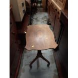 Good quality inlaid mahogany wine table with shaped tilt top on turned column and three splayed legs