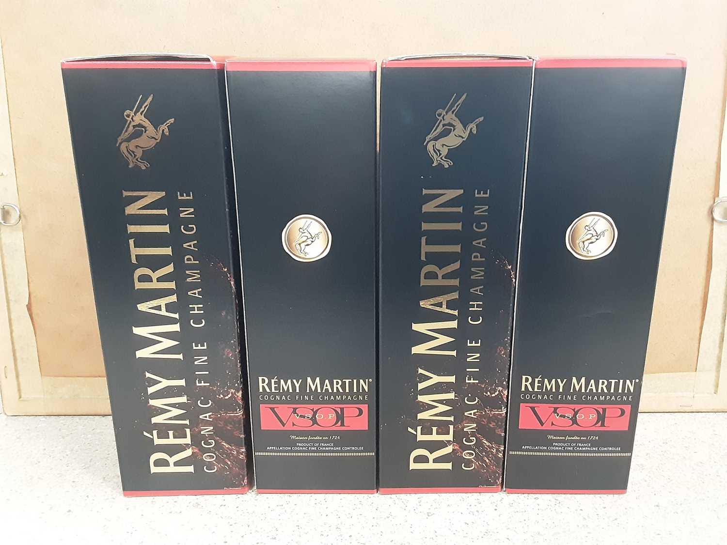 Four bottles of Remy Martin Cognac Fine Champagne 70cl, in original boxes