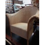 Set of four good quality Lloyd Loom Eastward wicker chairs and a matching coffee table (5)