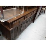 Old Charm carved oak sideboard with three drawers and cupboards below, 152.5cm wide, 44.5cm deep, 81