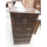 Old Oak cupboard with two carved panelled doors and three drawers below, 61cm wide, 36.5cm deep, 120