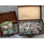 Two vintage suitcases containing costume jewellery