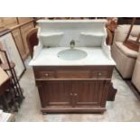 19th centuryContinental marble topped washstand / sink with water cistern above, enamelled sink and