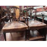 Pair of 1920's mahogany elbow chairs with leather seats and a pair of Victorian dining chairs
