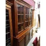 Good quality reproduction two height bookcase/unit with shelved interior enclosed by three glazed do