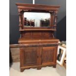 Edwardian carved walnut two height sideboard with bevelled mirror back H192.5, W124, D46cm