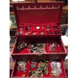 Four jewellery boxes, two containing various costume jewellery