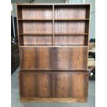 Mid century Danish rosewood two height bookcase with open shelves, fall flap enclosing stationary co