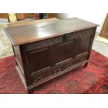 Late 17th / early 18th century carved oak mule chest, with hinged top over carved frieze and triple