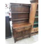 Oak two height dresser with two drawers and two carved panelled doors below, 91cm wide, 42cm deep, 1