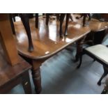 Victorian mahogany dining table with extra leaf on turned legs, together with six Queen Anne style c