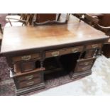 Late Victorian walnut kneehole desk with drawers and cupboards below, 126.5cm wide, 55cm wide, 83cm