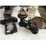 Old Bakelite telephone and a pair of vintage scales with weights