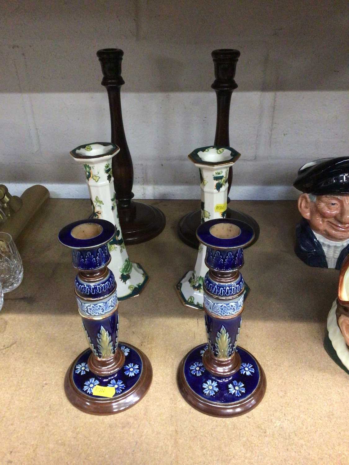 Pair of Doulton Lambeth candlesticks, pair of Mason's Chartreuse candlesticks, and a pair of turned