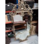 Large ornate brass mirror