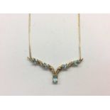 9ct gold aquamarine and diamond set necklace