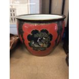 Carlton Ware jardiniere, decorated with tropical birds on a red and gilt ground