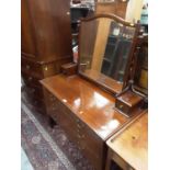 Edwardian inlaid mahogany dressing table with raised bevelled mirror back, two short and two long dr