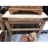 Large wooden butcher's block on stand