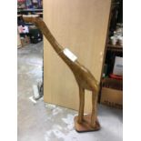 Large carved wood giraffe